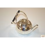 A small plated teapot in the manner of Dr Christopher Dresser