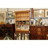 A pine open fronted bookcase with adjustable shelv