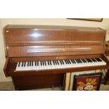 A Bentley upright piano no.125449