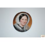 A finely painted Victorian miniature portrait on m