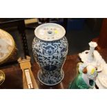 A Chinese blue and white ceramic vase / lamp base