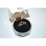 Two 9ct gold rings set with diamonds; rubies and s