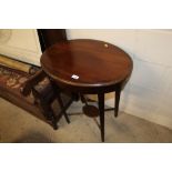 A mahogany oval occasional table