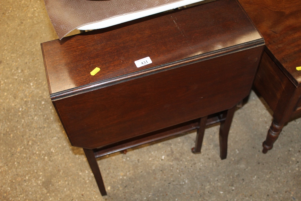 An Edwardian mahogany Sutherland table