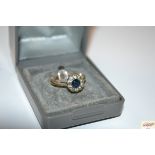 A 9ct gold blue and white stone cluster ring