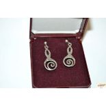 A vintage sterling silver Celtic serpent drop ear-