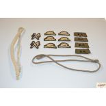 A bag of mixed military cloth badges etc