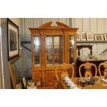 An 18th Century style break front display cabinet