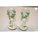 A pair of 19th Century porcelain candlesticks in t