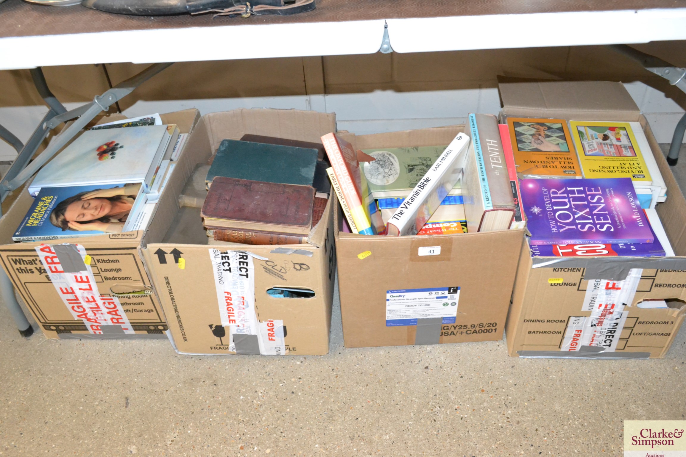 Four boxes of miscellaneous books