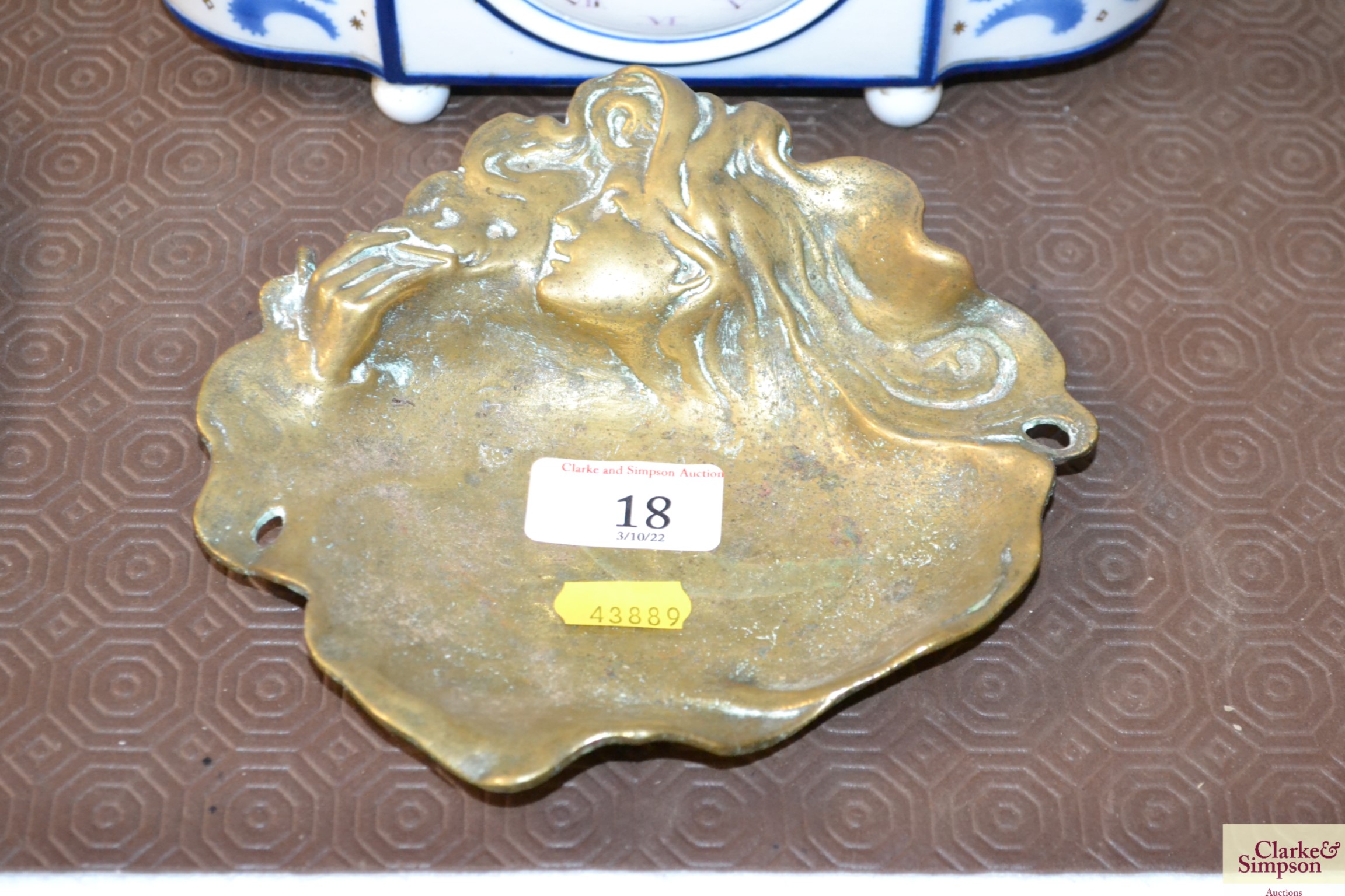 A small brass Art Nouveau design ashtray