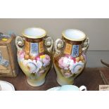 A pair of Noritake floral decorated baluster vases