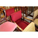 A pair of 1930's oak elbow chairs