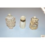 A carved bone snuff bottle in the form of an owl;