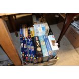 A box of 17 assorted jig saw puzzles