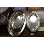 Three oval plated platters