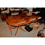 A reproduction yew wood D end extending dining tab