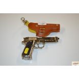 A Starline toy gun and holster