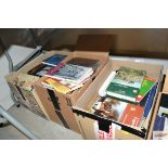 Three boxes of miscellaneous books