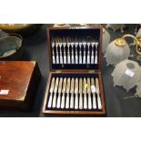 A cased set of twelve plated and mother of pearl h