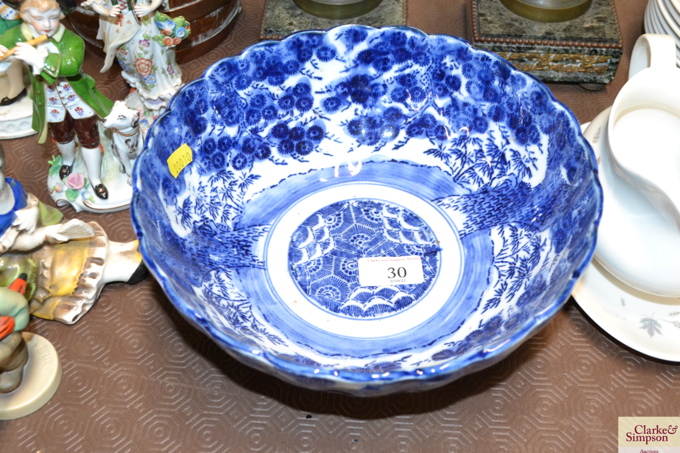 A Japanese blue and white scallop bordered bowl