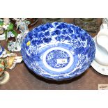A Japanese blue and white scallop bordered bowl