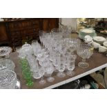 A large collection of table glassware including fo