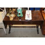 A mahogany drop leaf sofa type coffee table