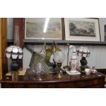 A collection of various decorative table lamps inc