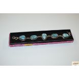 A .925 turquoise colour stone bracelet