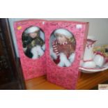 Two boxed dress dolls