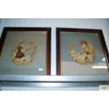 A pair of framed and glazed tapestries