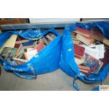 Two Ikea bags of various vintage books etc.