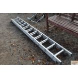 An extending aluminium ladder