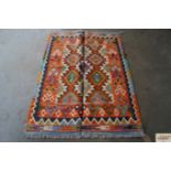 An approx. 4'7" x 3'2" Chobi Kelim rug