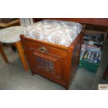 A Victorian mahogany piano stool