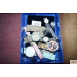 A box of various wrist watches