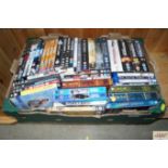 A box of various DVD's