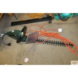 A Bosch electric hedge trimmer