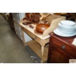 A stripped pine wash stand fitted single drawer