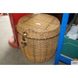 A wicker basket of cylindrical form