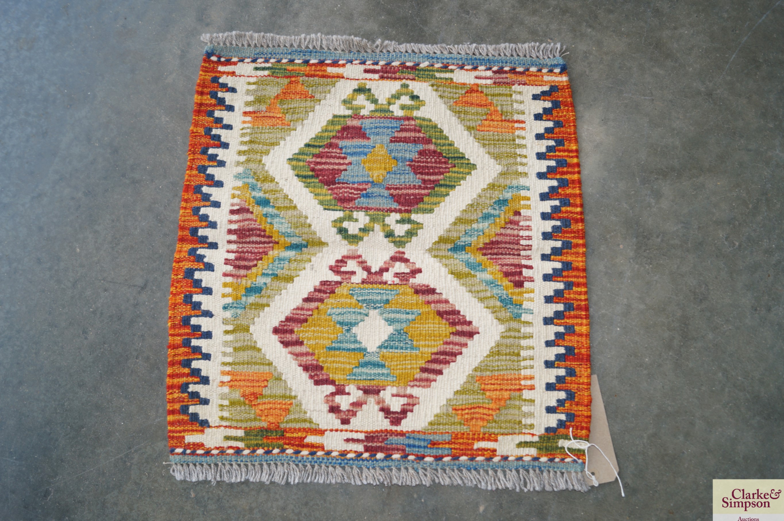 An approx. 1'6" x 1'5" Chobi Kelim rug