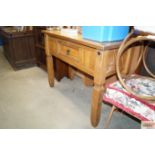 A modern pine console table fitted single drawer