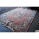 An approx. 12' x 8'6" Chinese wool rug