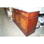 A reproduction mahogany sideboard fitted three dra