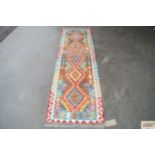 An approx. 7' x 2' Chobi Kelim runner