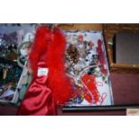 A tray of costume jewellery and a ring tree