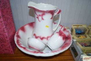 A wash bowl set comprising of a wash jug and bowl,