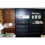 An open fronted bookcase