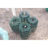 Four rolls of garden edging